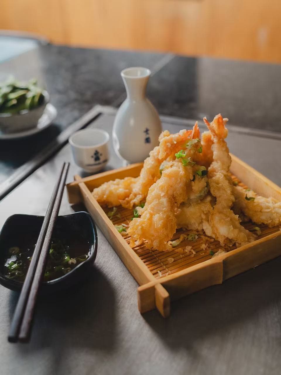 Shrimp tempura in a wooden tray