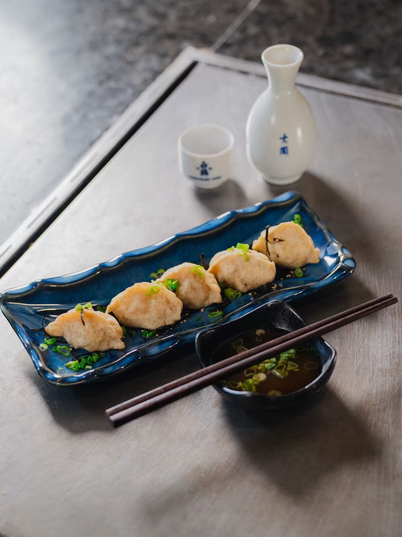 Maki roll on a black plate